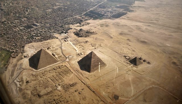 An aerial view of the Pyramids of Giza close to the city. Photo by Dario Morandotti