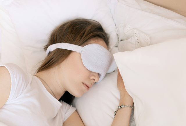 Creating a sleep-inducing environement, such as wearing an eye mask can help you sleep better.